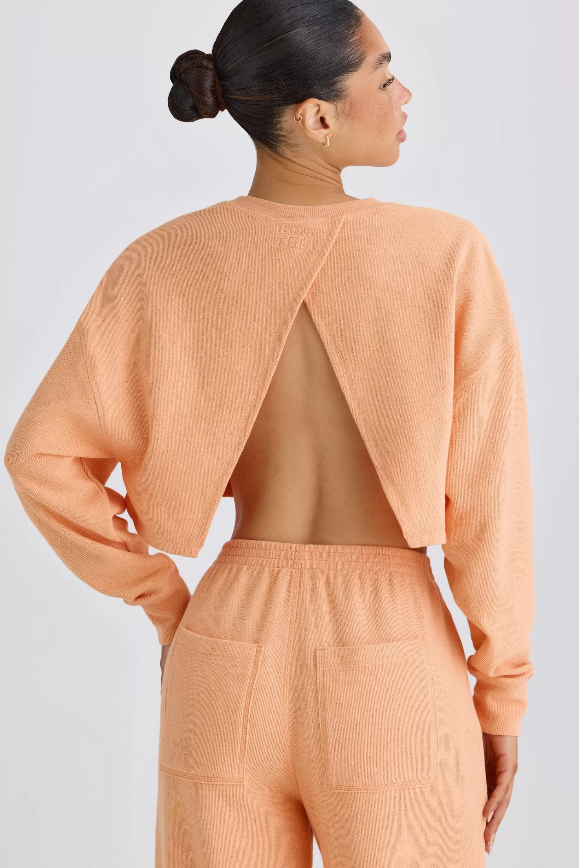 Oh Polly Crew-Neck Open-Back Cropped Sweatshirt in Peach Clearance