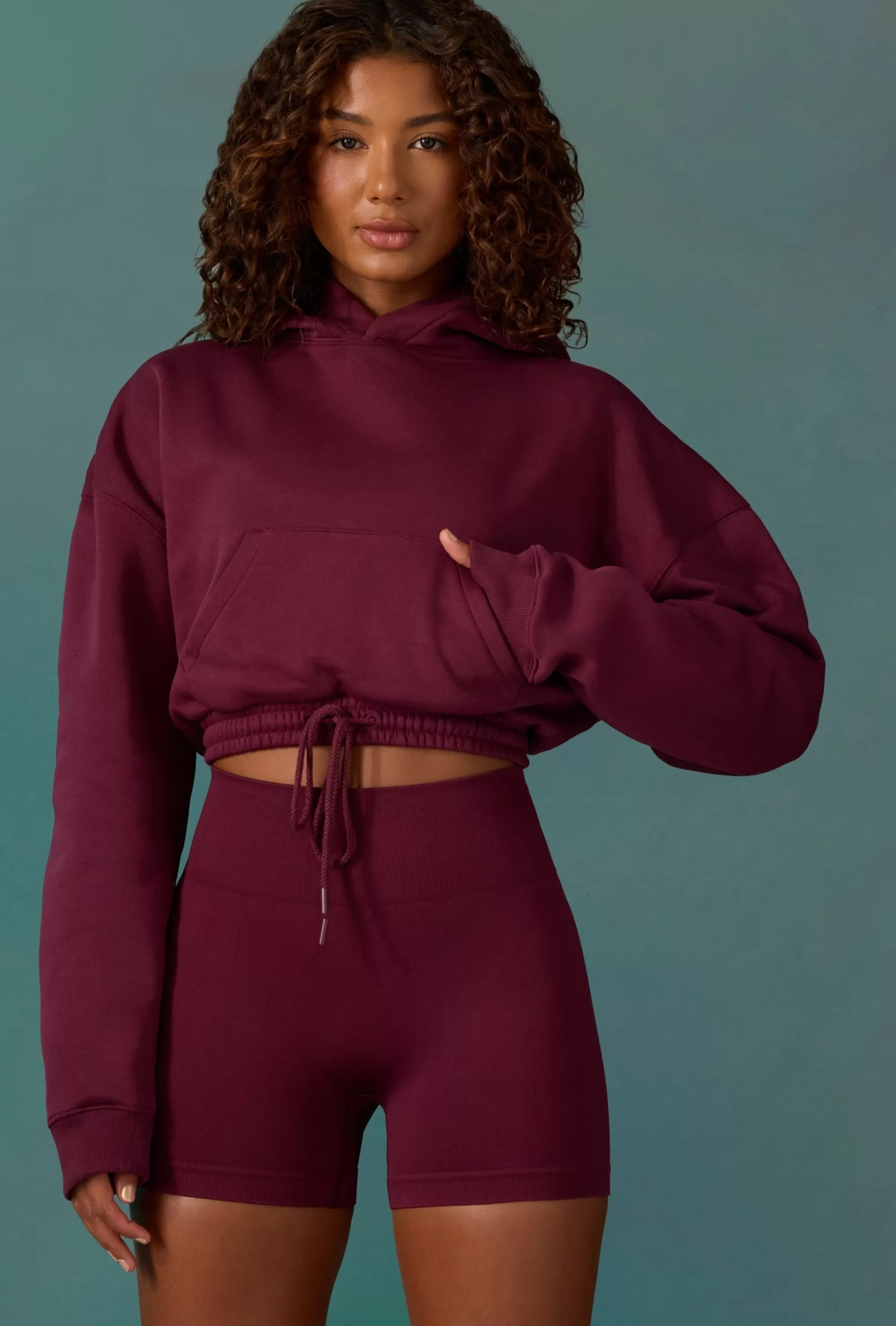 Oh Polly Cropped Drawstring Hooded Sweatshirt in Plum Clearance