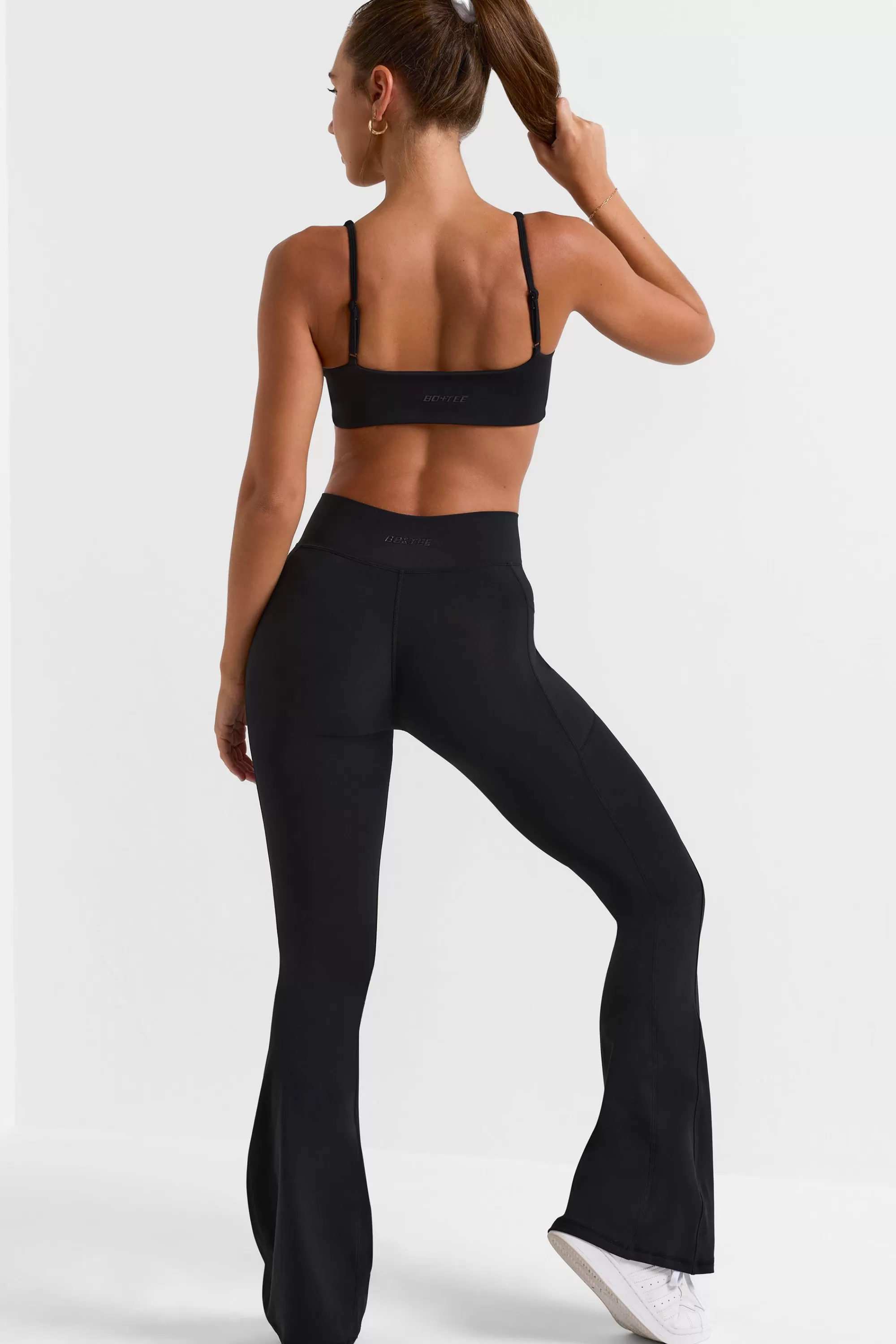 Oh Polly Cross Waistband Flare Pocket Leggings in Black Best