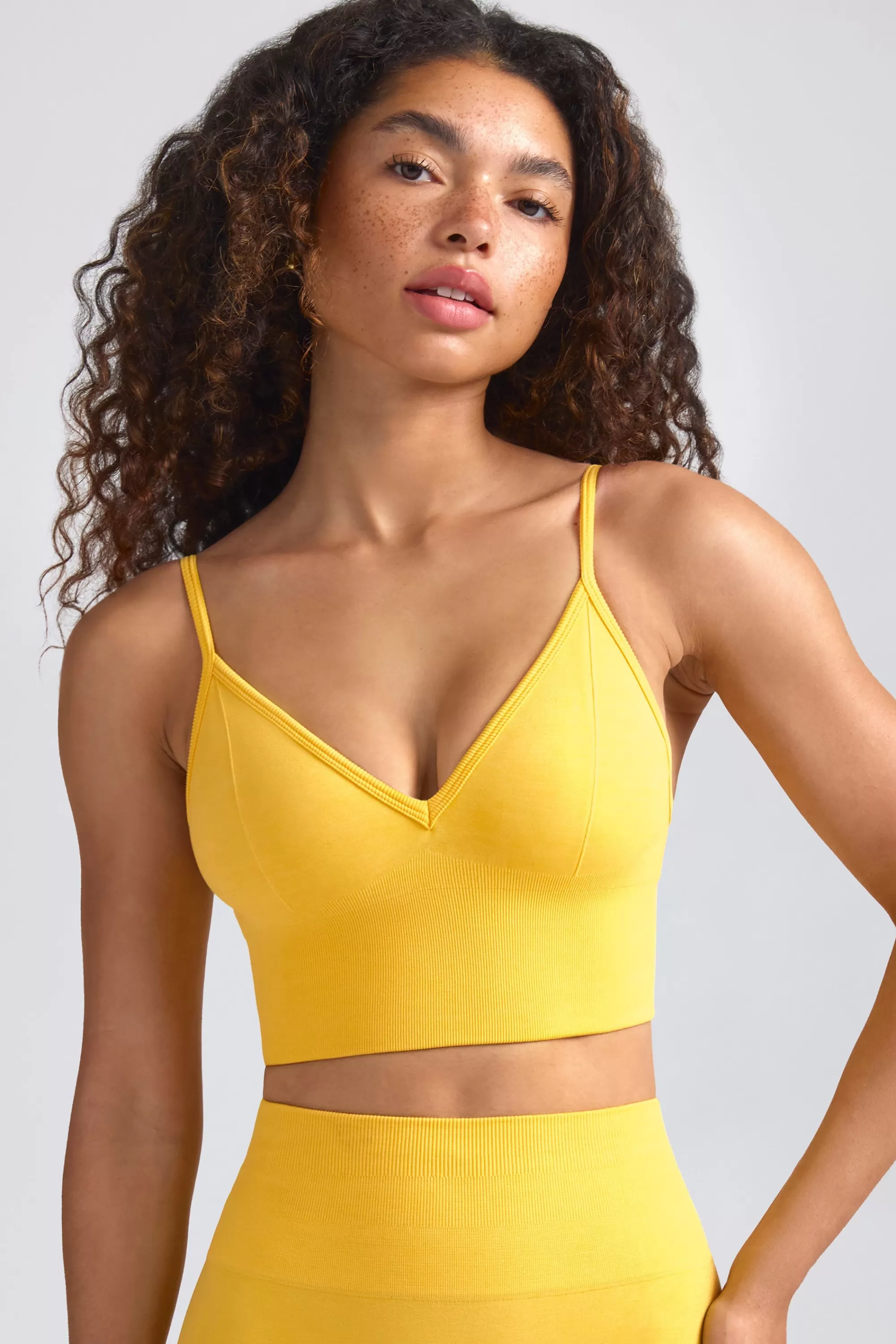 Oh Polly Define Luxe V-Neck Sports Bra in Golden Yellow Hot