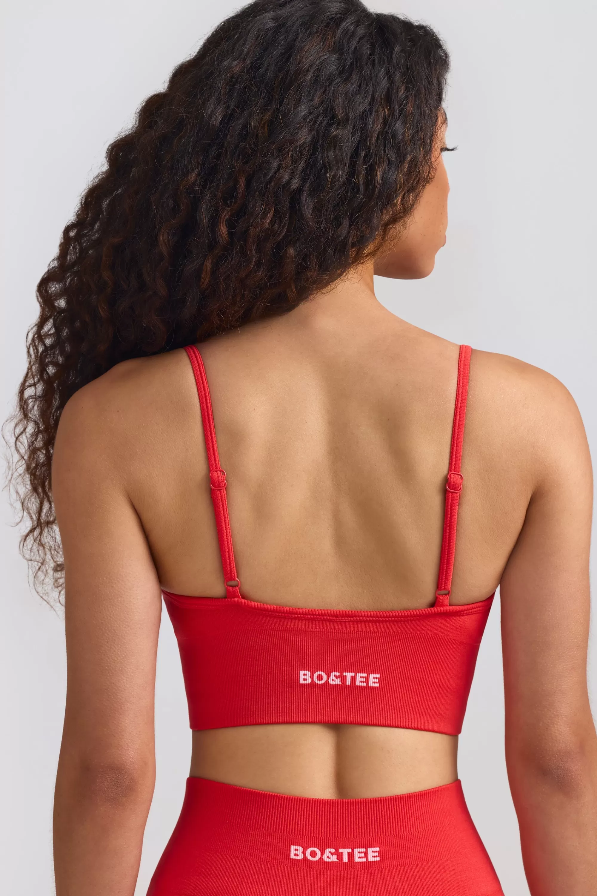 Oh Polly Define Luxe V-Neck Sports Bra in Poppy Red Flash Sale