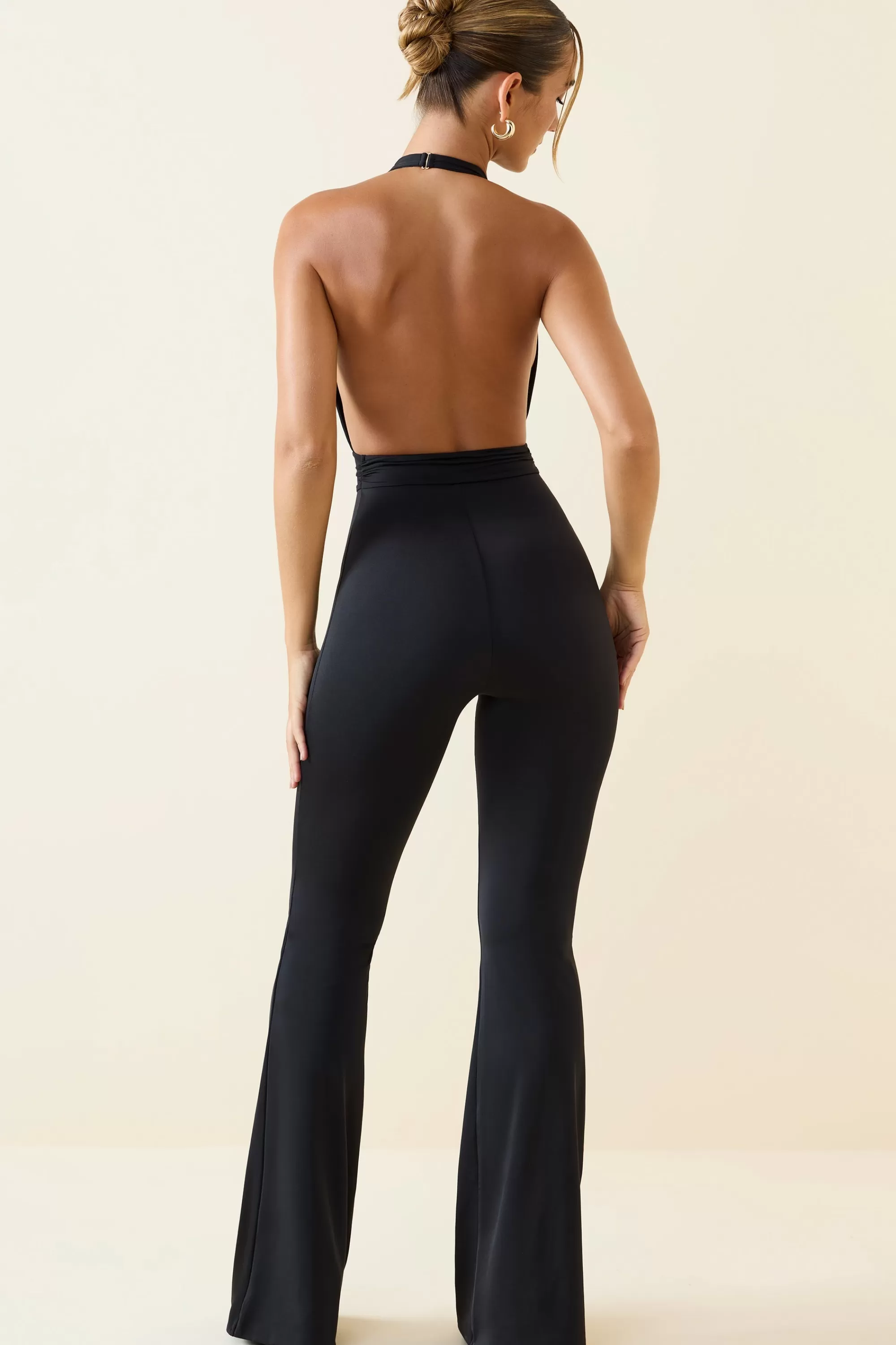 Oh Polly Halterneck Cut-Out Flared Jumpsuit in Black Discount