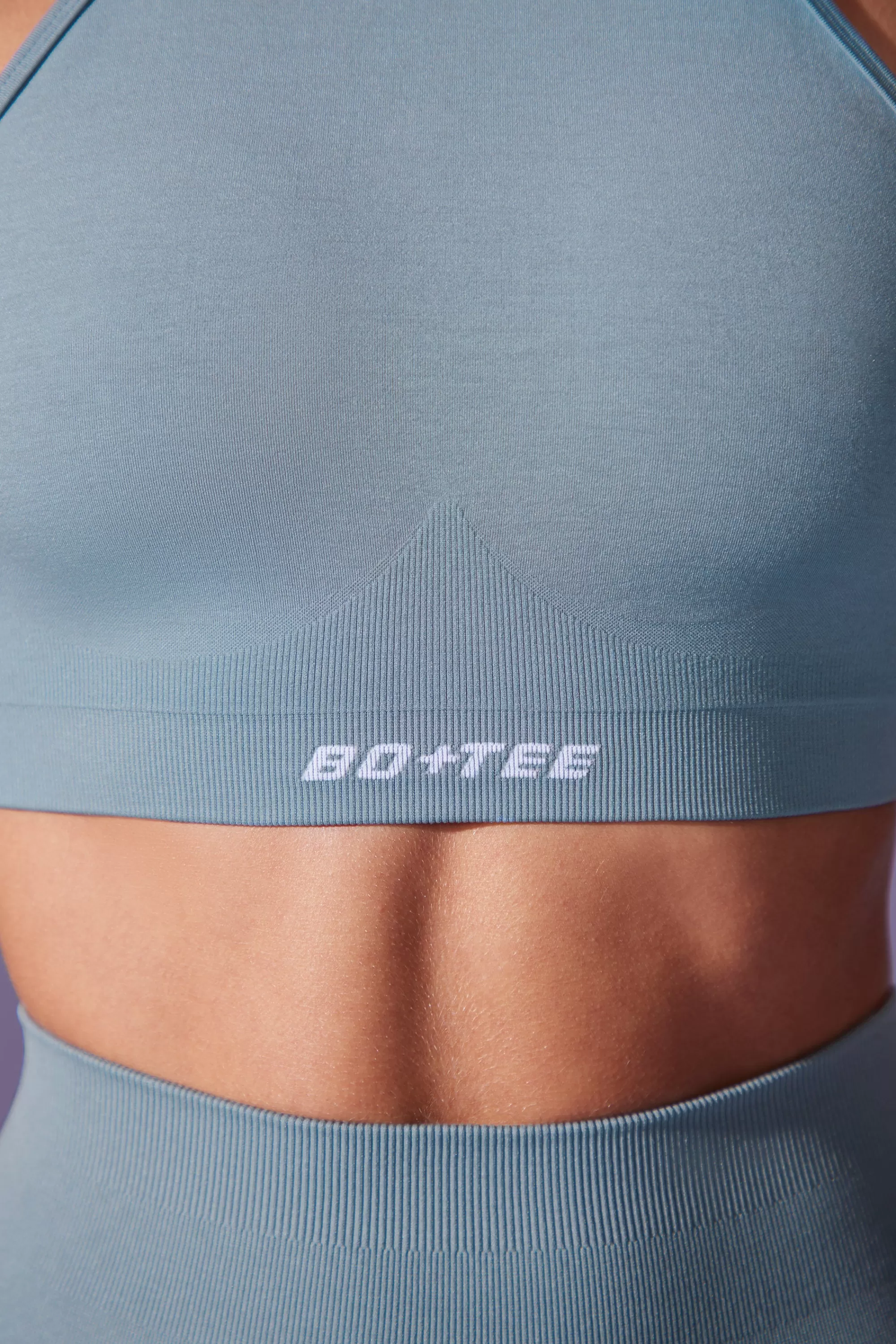 Oh Polly High Neck Open Back Define Luxe Sports Bra in Denim Blue DenimBlue Hot