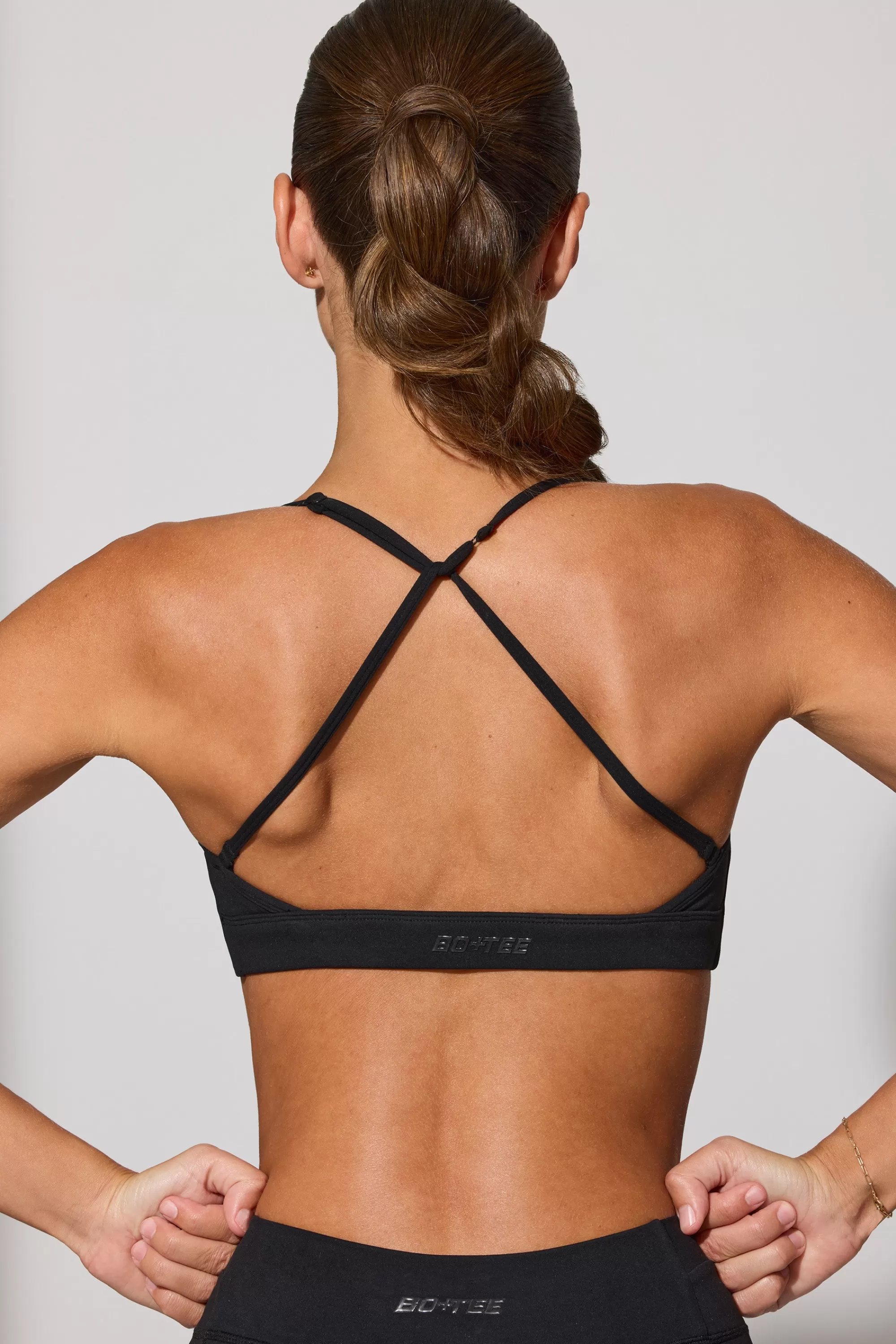 Oh Polly Multiway Twist Front Sports Bra in Black Sale