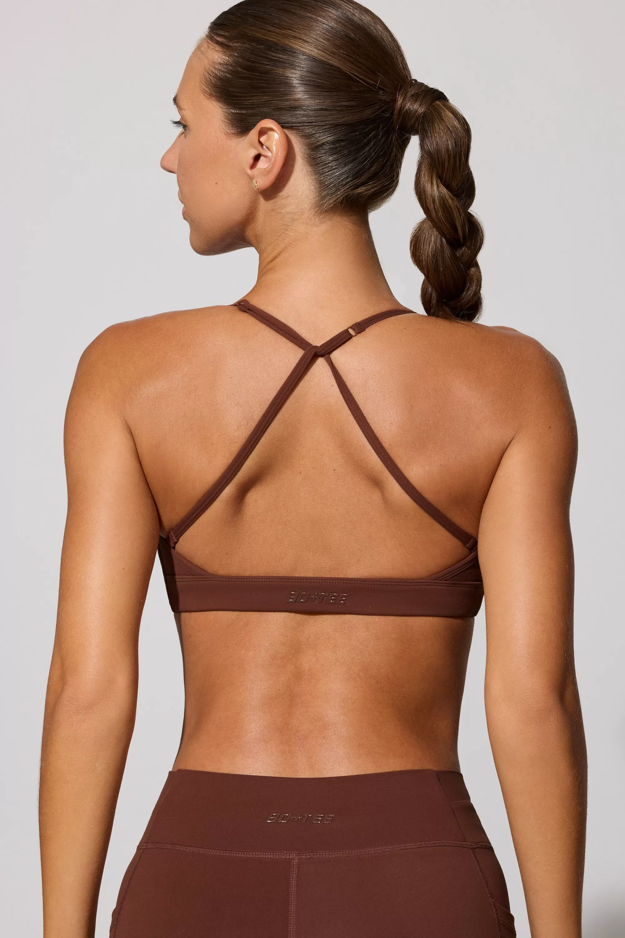 Oh Polly Multiway Twist Front Sports Bra in Chocolate Hot