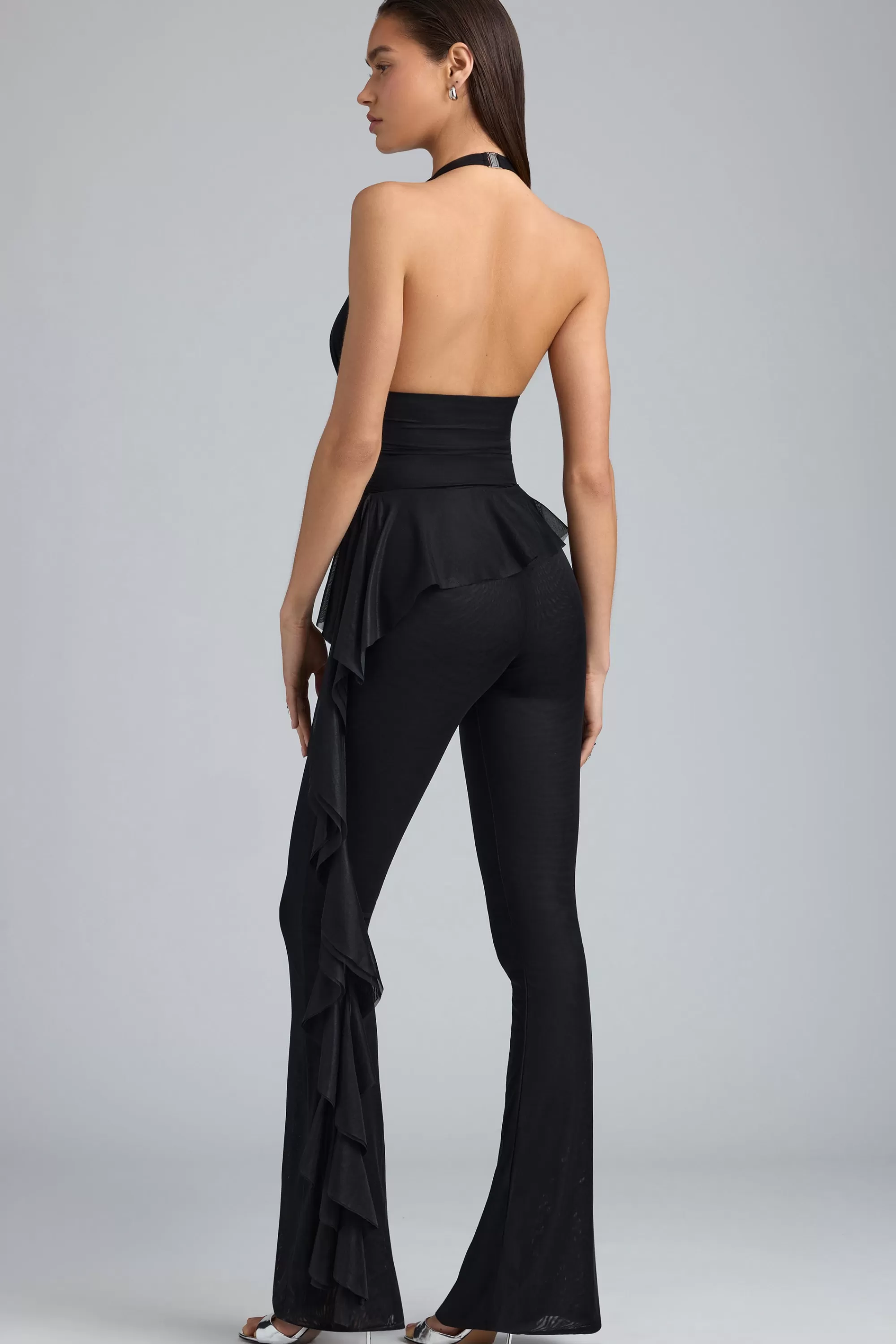 Oh Polly Petite Metallic Ruffle Low-Rise Flared Trousers in Black Hot