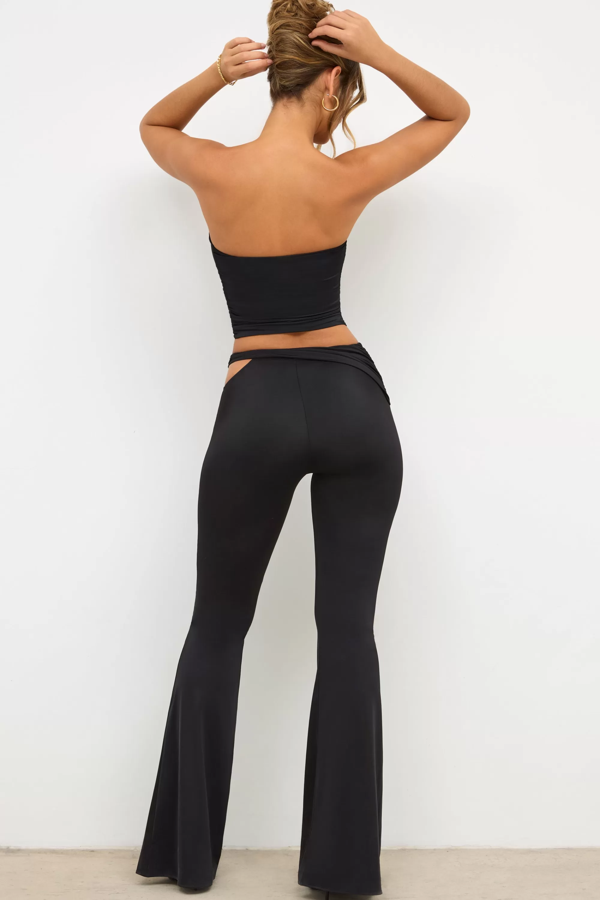 Oh Polly Petite Premium Jersey Rose Detail Mid-Rise Flare Trousers in Black Shop