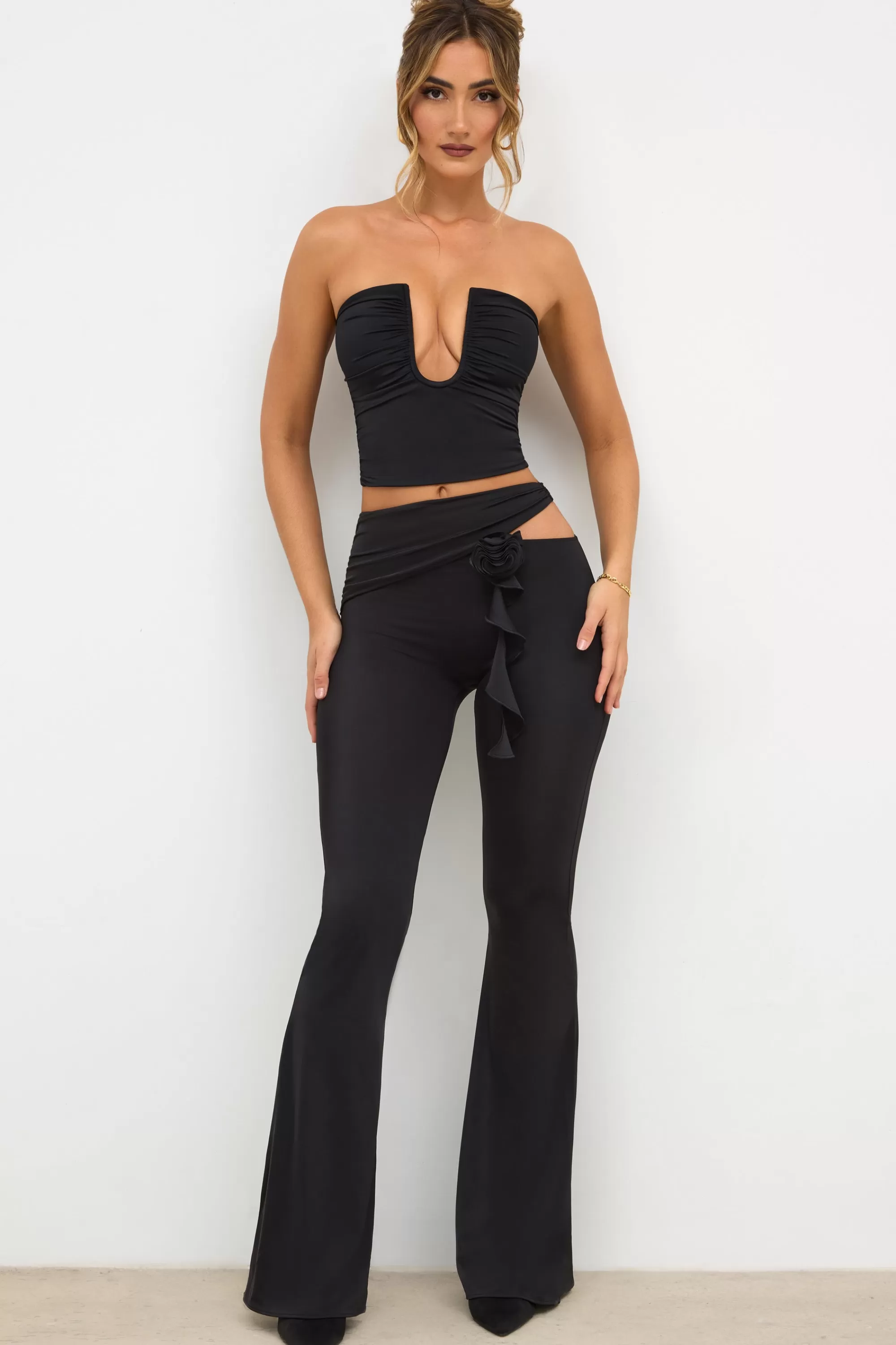 Oh Polly Petite Premium Jersey Rose Detail Mid-Rise Flare Trousers in Black Shop