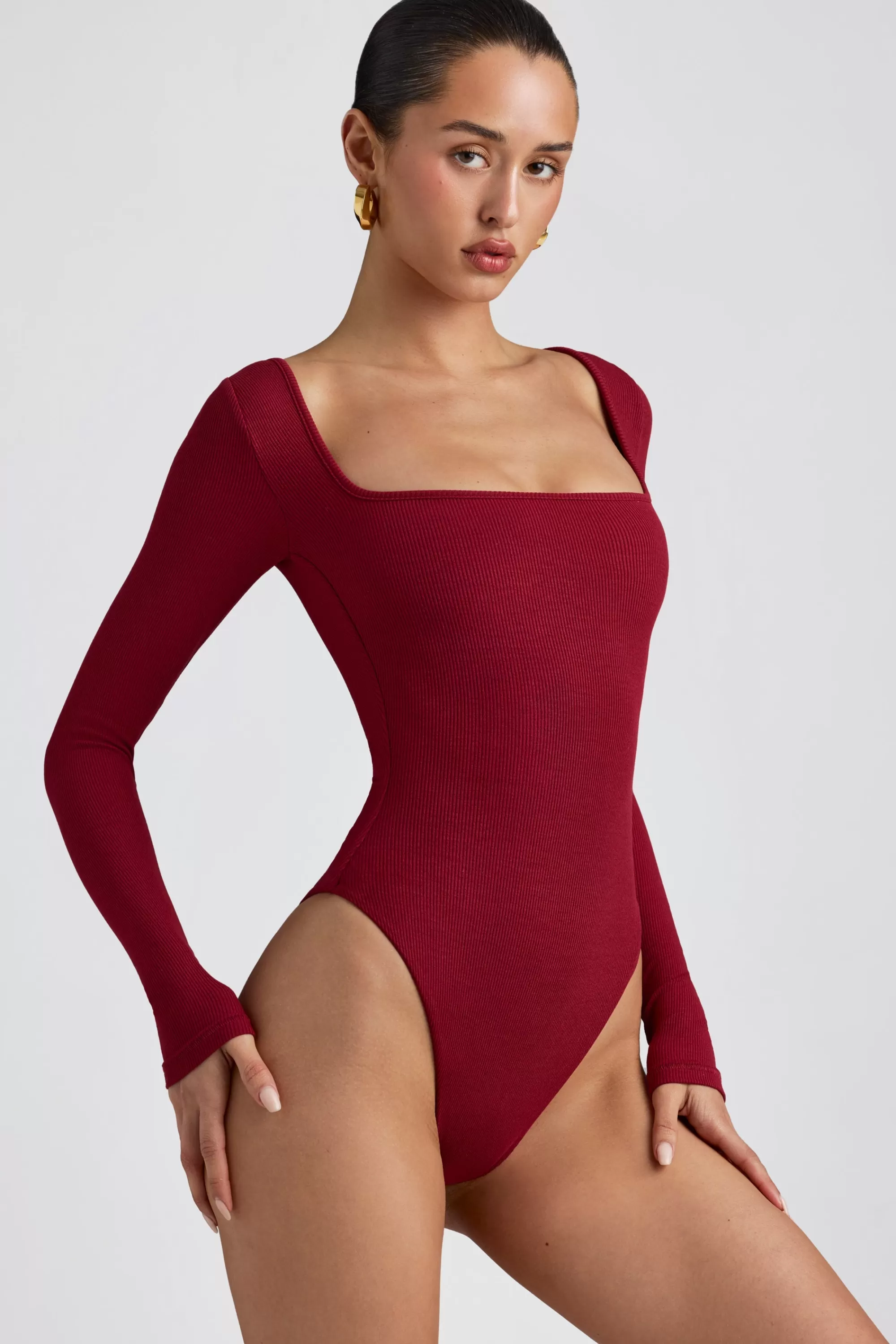 Oh Polly Ribbed Modal Long Sleeve Bodysuit in Maroon Hot