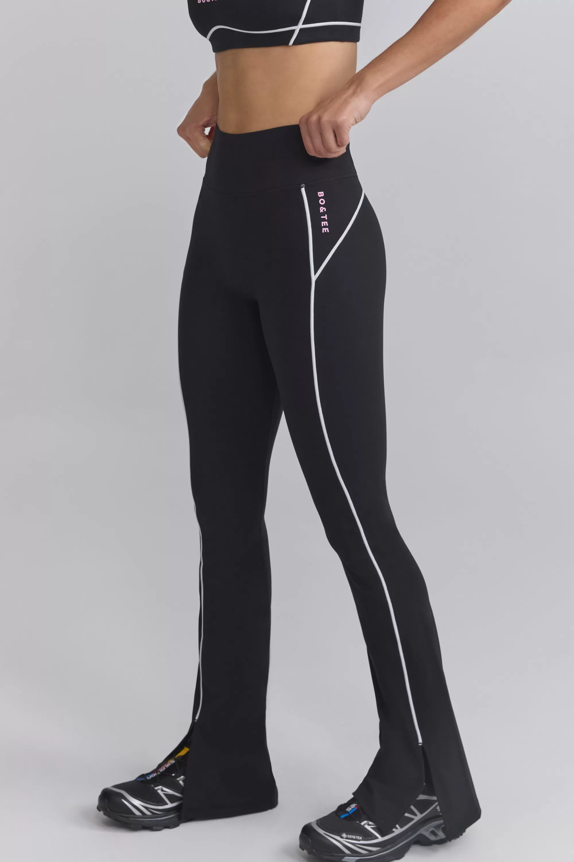 Oh Polly Soft Active Contrast-Trim Flared Trousers in Black Outlet