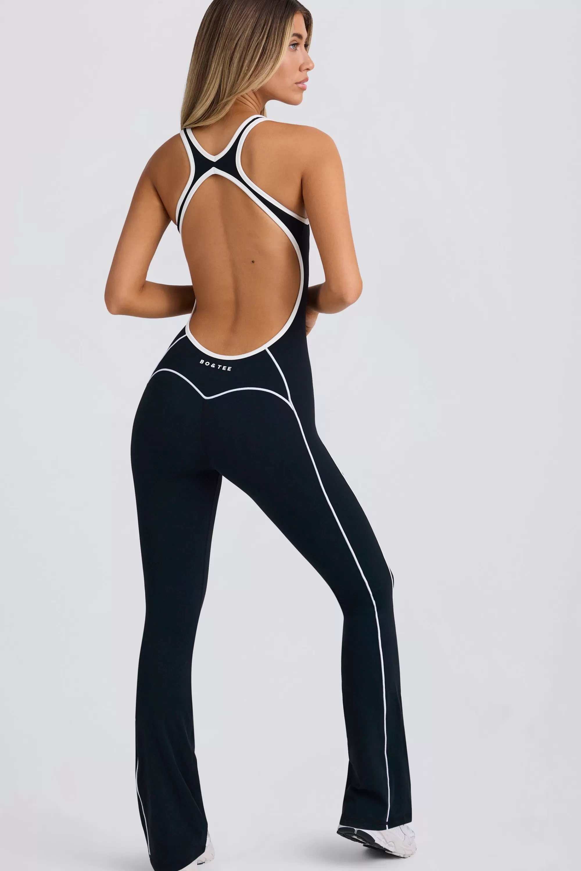 Oh Polly Soft Active Open-Back Jumpsuit in Black Store