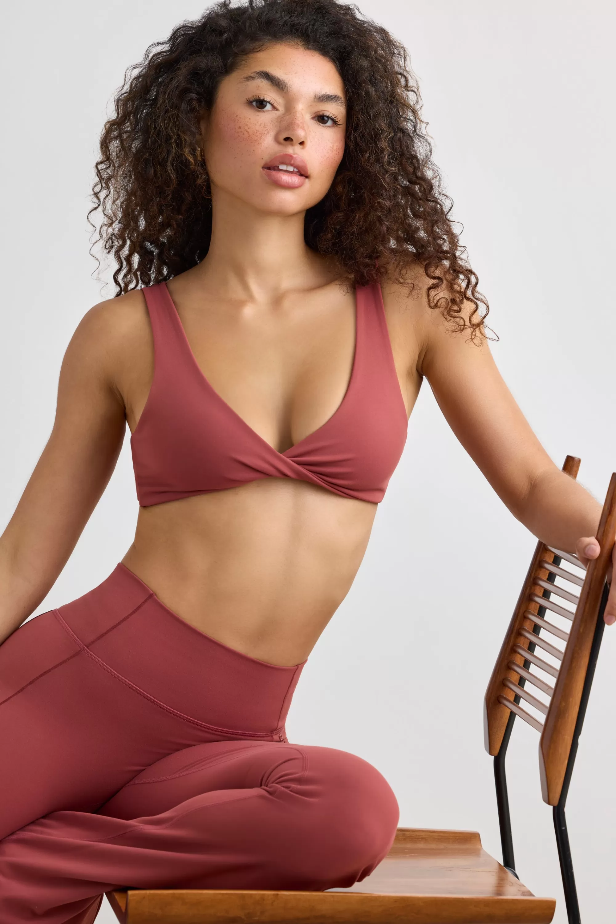 Oh Polly Soft Active V-Neck Sports Bra in Rust Fashion