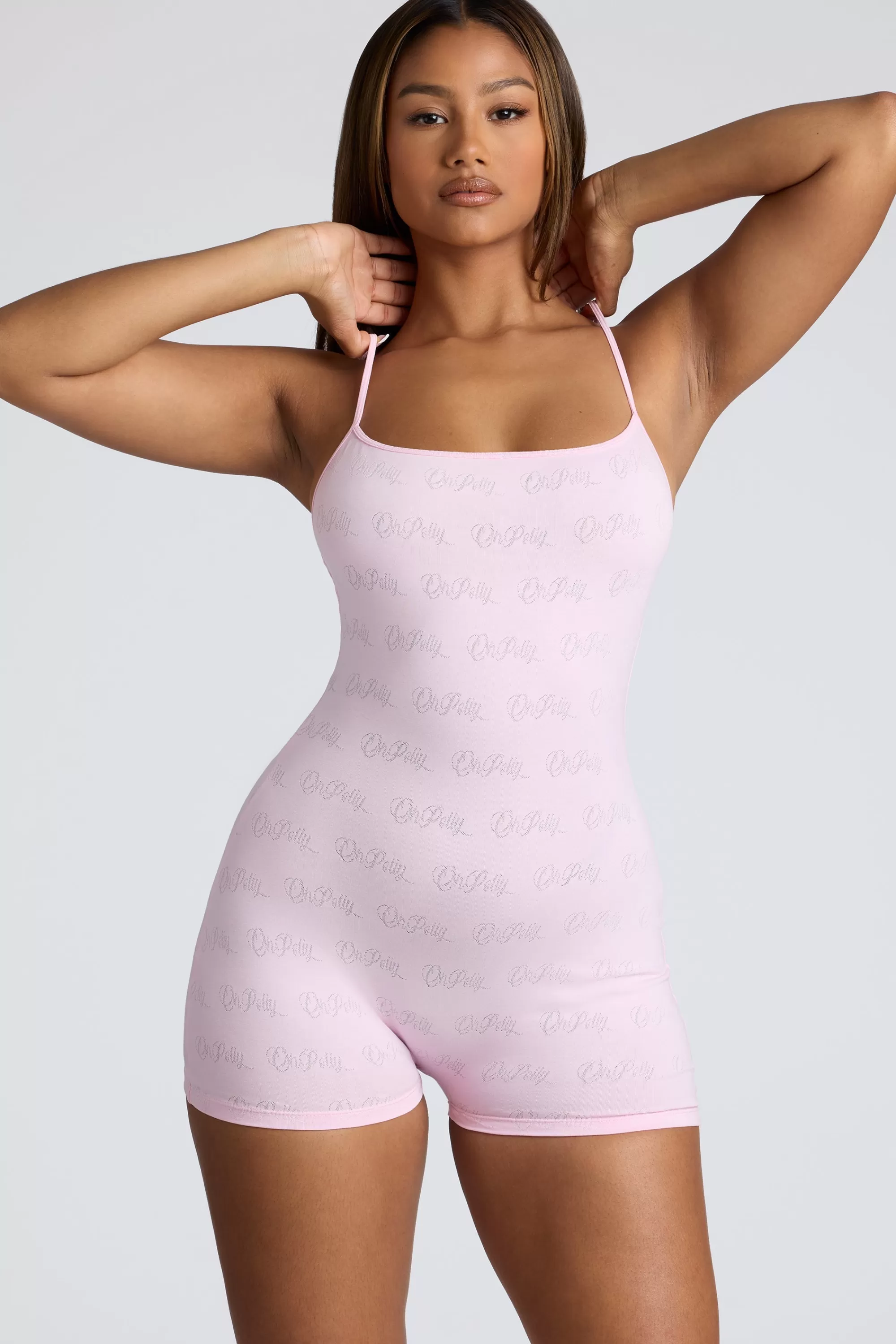 Oh Polly Strappy Low Back Pointelle Romper in Baby Pink BabyPink Hot