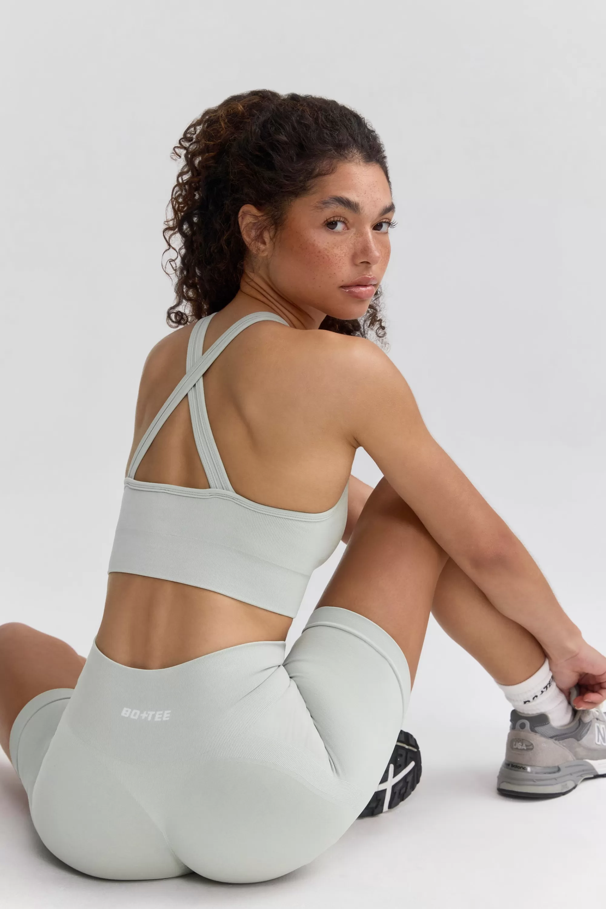 Oh Polly Super Sculpt Seamless Cross Back Sports Bra in Fog IceGrey Shop