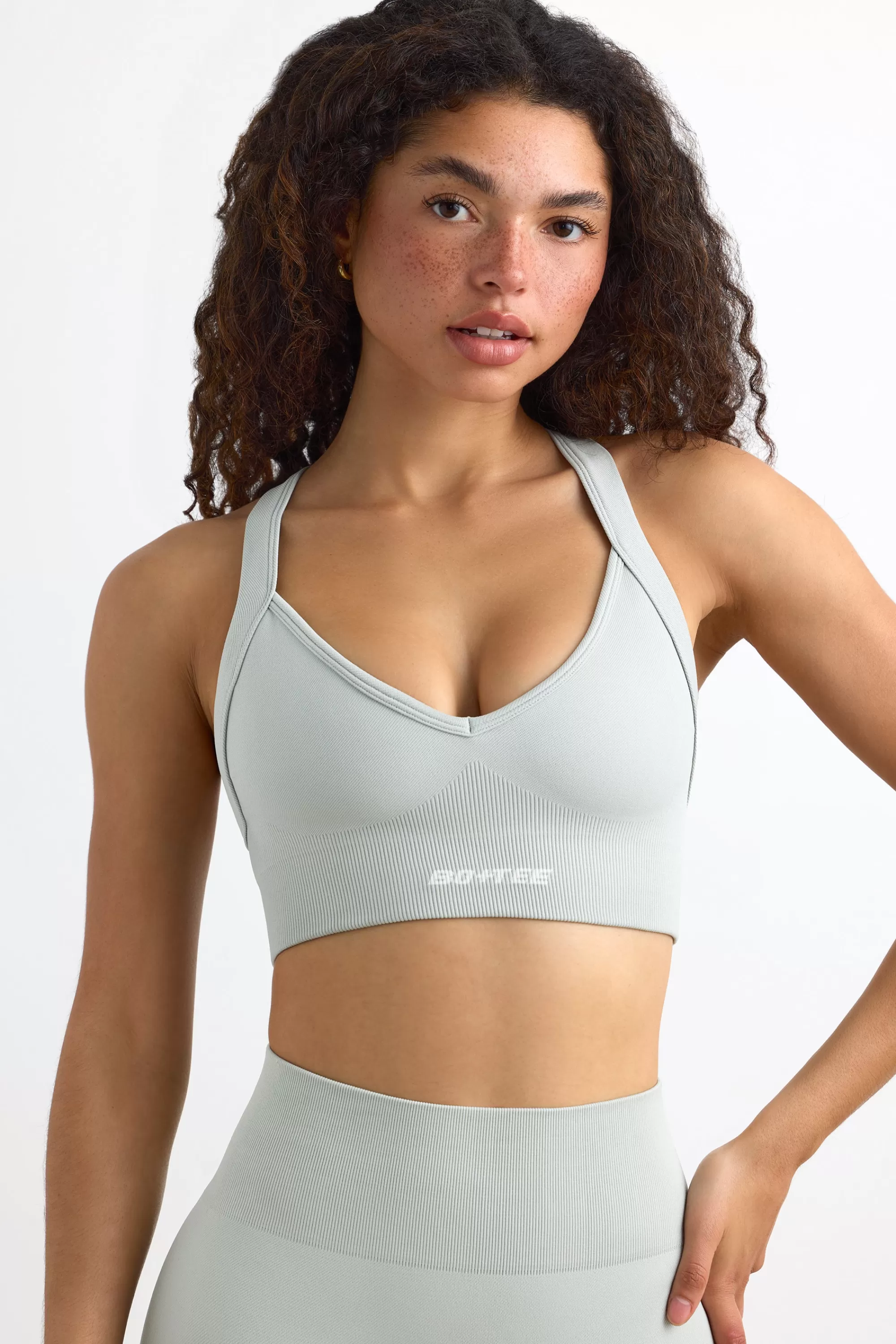 Oh Polly Super Sculpt Seamless Cross Back Sports Bra in Fog IceGrey Shop