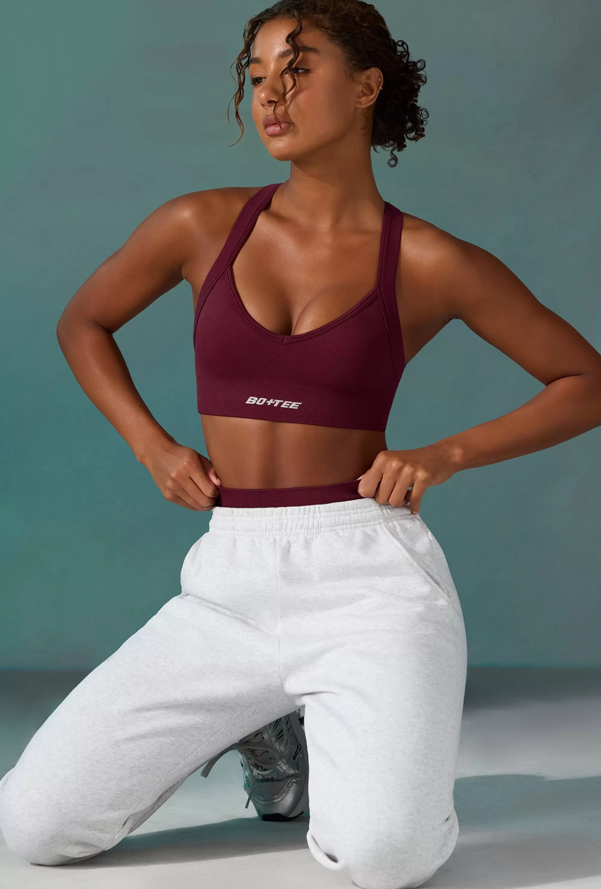 Oh Polly Super Sculpt Seamless Cross Back Sports Bra in Plum Store